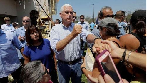 Vice President Mike Pence and his wife Karen visit victims of Hurricane Harvey in Rockport, Texas, on Aug. 31, 2017. (AP photo)
