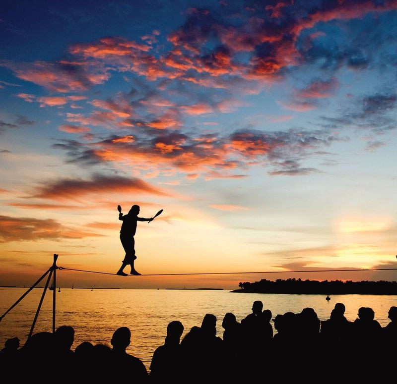 Will Soto performs a juggling and high-wire act at the Sunset Celebration at Mallory Square in Key West. ROB O’NEAL / FLORIDA KEYS NEWS BUREAU