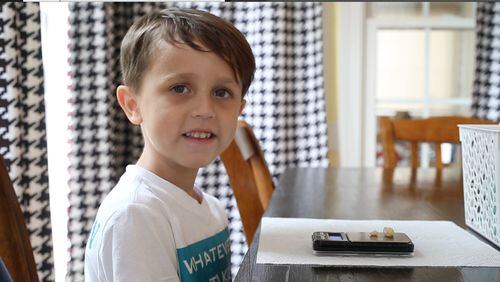 Six-year-old Elias Kroboth eats about 1.5 grams of peanuts as part of his daily Oral Immunotherapy treatment plan on Thursday, July 12, 2018 in Raleigh, N.C. After gradually increasing his consumption of peanuts, and passing a test with his doctor, Kroboth can consume peanut products freely.
