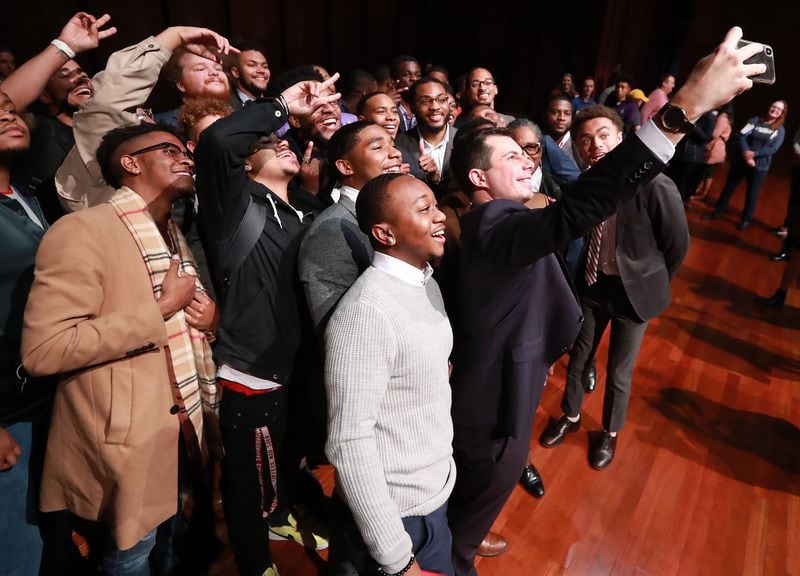 November 18, 2019 Atlanta: Presidential hopeful Pete Buttigieg, Mayor South Bend, Indiana, snaps a selfie with students after speaking while launching a new effort to win over black voters during a conversation at Morehouse College on Monday, November 18, 2019, in Atlanta.   Curtis Compton/ccompton@ajc.com