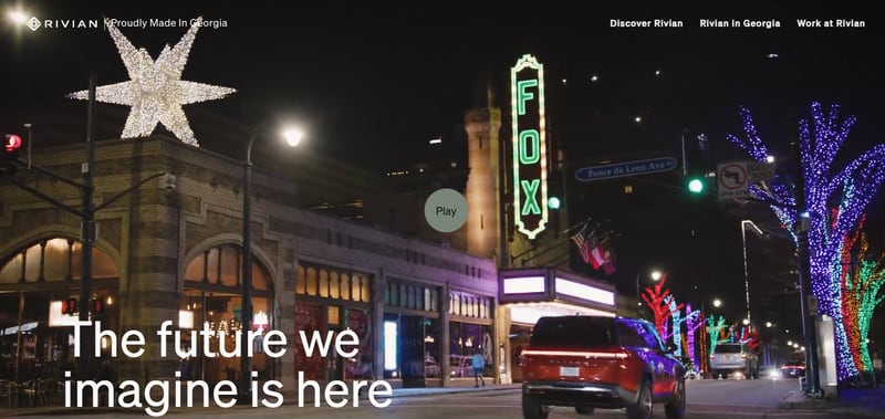 Electric vehicle manufacturer Rivian has launched an online campaign to illustrate its commitment to Georgia, even though it recently paused its construction of a $5 billion factory about an hour east of Atlanta. A scene from the campaign shows one of the company's SUVs traveling past Atlanta's Fox Theater.