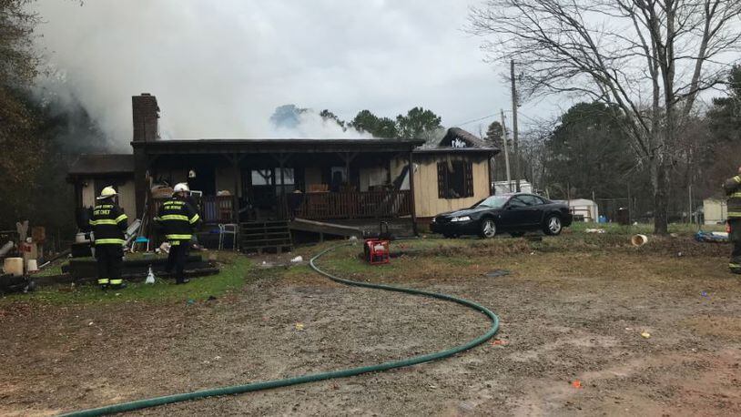 Crews battle a deadly fire in the 300 block of Wages Road in Barrow County.