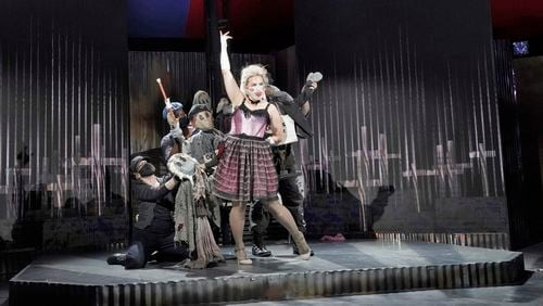 Polly Peachum (Kelly Kaduce) is surrounded by puppet beggars during The Atlanta Opera’s new production of “The Threepenny Opera.”
Courtesy of Ken Howard