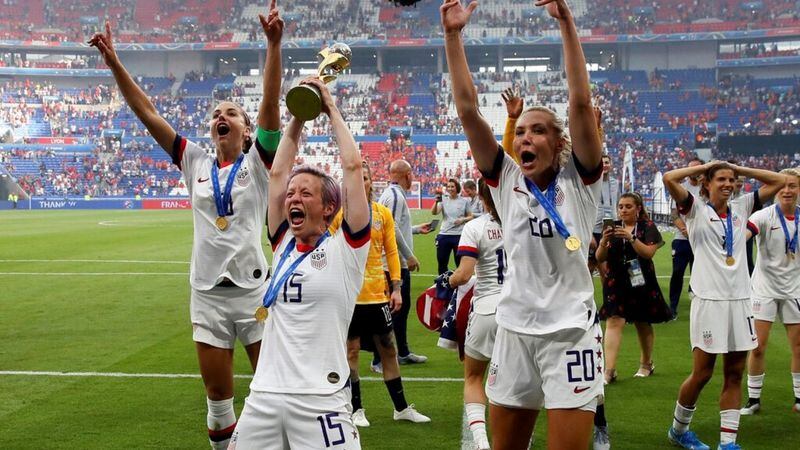 United States' Megan Rapinoe , center left, celebrates with teammates their victory in the Women's World Cup final soccer match Sunday, July 7, 2019. 