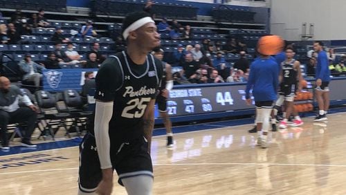 Georgia State's Jalen Thomas goes through the layup line before the home opener with Brewton-Parker. The Panthers wore their new black uniforms for the occasion.