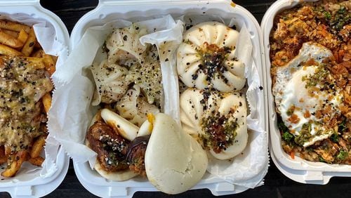 Mushi Ni’s serves Asian-American fusion food, such as duck fries; steamed buns and dumplings; and chop suey rice box with a fried egg. Wendell Brock for The Atlanta Journal-Constitution