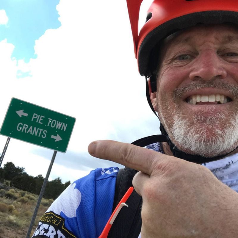 Mark Finley of Spokane says he could almost taste the pie coming up in seven miles at Pietown as he rides a segment of the 2,750-mile Great Divide Mountain Bike Route. (PHOTO COURTESY OF MARK FINLEY)