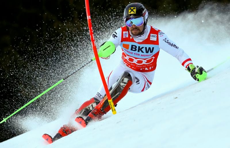 FILE - Austria's Marcel Hirscher speeds down the course during an alpine ski, men's World Cup slalom in Wengen, Switzerland, Sunday, Jan. 14, 2018. Marcel Hirscher, one of the most successful ski racers of all time, is planning to return next season after five years in retirement. And the record eight-time overall World Cup champion is going to compete for the Netherlands — his mother's country — instead of his native Austria. (AP Photo/Alessandro Trovati, File)