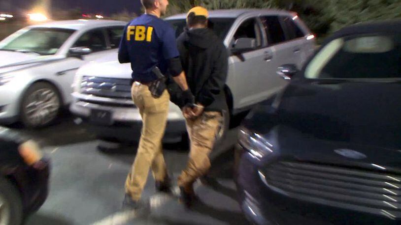 Sixteen people were arrested and a child was rescued in the sting. (Credit: FBI)