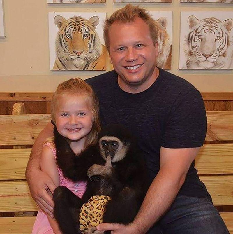 Scott Engel, shown here on a trip with his daughter to an animal sanctuary in Myrtle Beach, S.C., is having a quiet Thanksgiving with his daughter at a restaurant where they can eat outdoors. (Courtesy of Scott Engel)