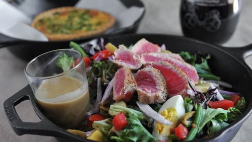 Spinach quiche and Salad Nicoise with seared ahi tuna at Le Bistro in Roswell. (BECKY STEIN)