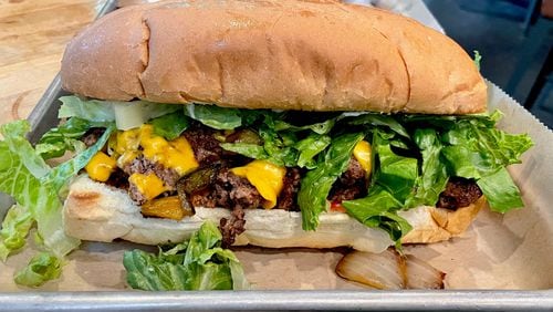 The chopped cheese at Dead End Drinks was inspired by a famed New York City bodega sandwich. Angela Hansberger for The Atlanta Journal-Constitution