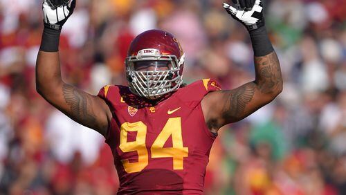 USC defensive end Leonard Williams projects to go early in the NFL draft, with a top-three selection likely. (AP Photo/Mark J. Terrill, File)