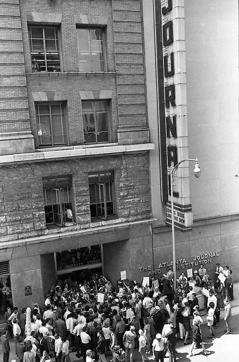 In this photo from 1970, Gov. Lester Maddox and supporters picket the front entrance of the 10 Forsyth building, which now housed both the Journal and Constitution. (Charles R. Pugh, Jr., AJCNS1970-07-04u GSU Special Collections)