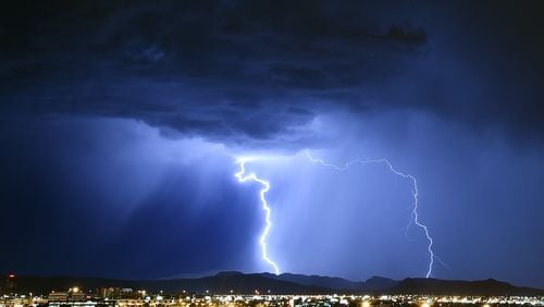 LAS VEGAS, NV - JULY 06: Lightning strikes during a thunderstorm on July 6, 2015 in Las Vegas, Nevada. (Photo by Ethan Miller/Getty Images)