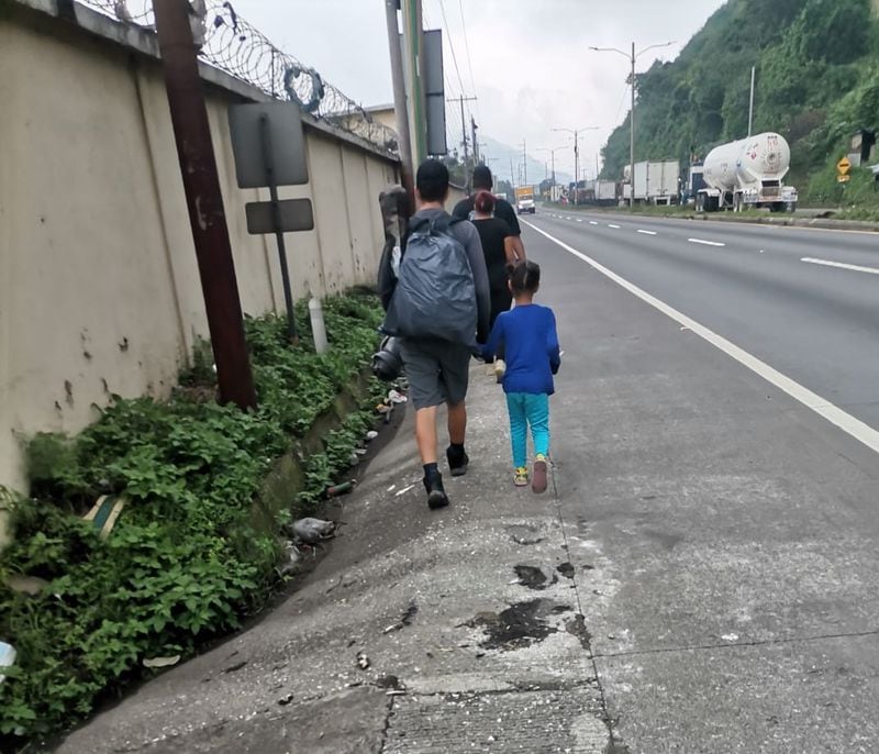 Yoselin's husband, Arturo, and their five-year-old daughter walk side-to-side in southern Mexico.