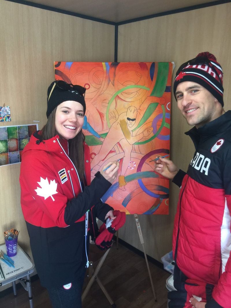 Canadian speed skaters (and husband and wife) Denny and Josie Morrison stopped by Roald Bradstock’s booth at the athletes village in Pyeongchang to contribute to the group paintings being created to commemorate the 2018 Winter Games. CONTRIBUTED BY ROALD BRADSTOCK
