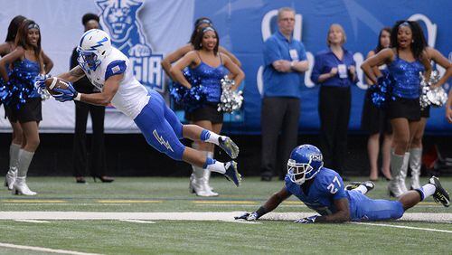 Air Force's Devin Rushing (5) dives for the end zone after being hit by Georgia State's Bruce Dukes (27) in the Panthers' loss Saturday, Sept. 13, 2014, at the Georgia Dome in Atlanta.