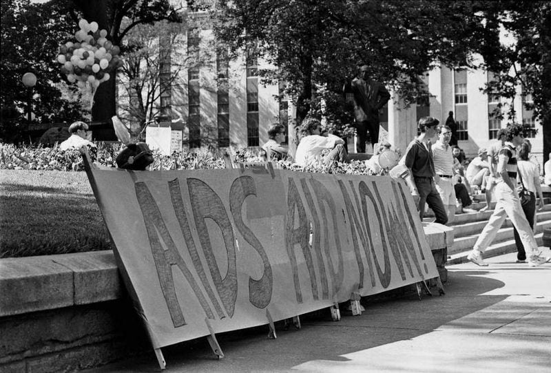 "AIDS Aid Now" sign at the Georgia State Capitol during an AIDS rally and vigil in 1988. Billy Downs/AJC