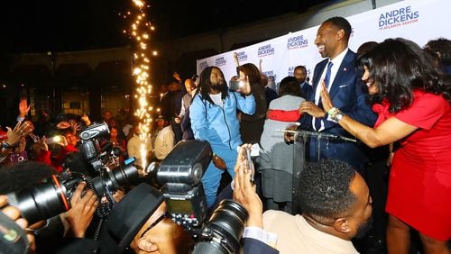 Flares go off as Atlanta Mayor-elect Andre Dickens concludes his victory address at his election night watch party on Tuesday, Nov. 30. Curtis Compton / Curtis.Compton@ajc.com