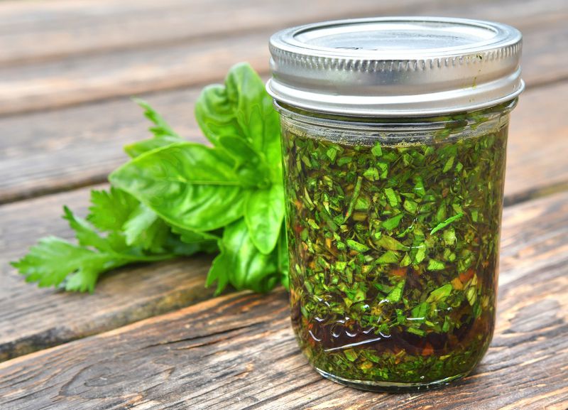 The recipe for Parsley- and Basil-Infused Red Wine Vinegar takes just three ingredients, but there’s a fourth element: time for the mixture to steep. STYLING BY NOELLE JOY / CONTRIBUTED BY CHRIS HUNT PHOTOGRAPHY