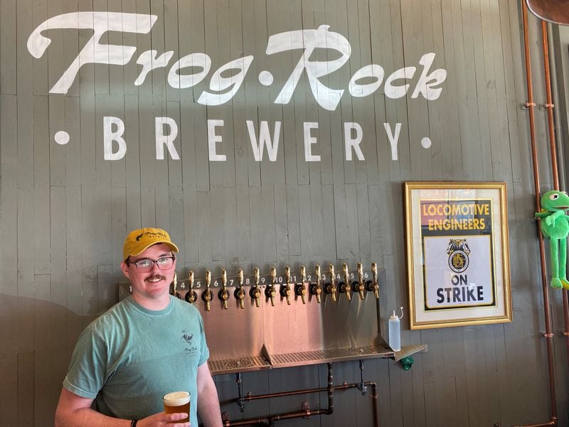 Brewer Ryan Hall has 16 beers on draft at Frog Rock Brewery, plus a variety of hard seltzers, as well as 16-ounce four-packs of cans. Bob Townsend for The Atlanta Journal-Constitution