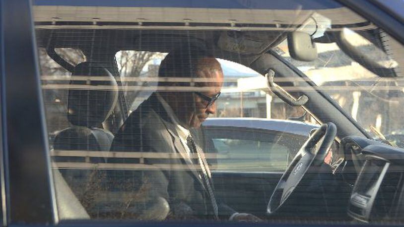 Elvin “E.R.” Mitchell leaves federal court Jan. 25, 2017, after pleading guilty in a bribery case involving city of Atlanta contracts. The city is refusing to release contracting and other records to the media, citing the investigation. HENRY TAYLOR/HENRY.TAYLOR@AJC.COM