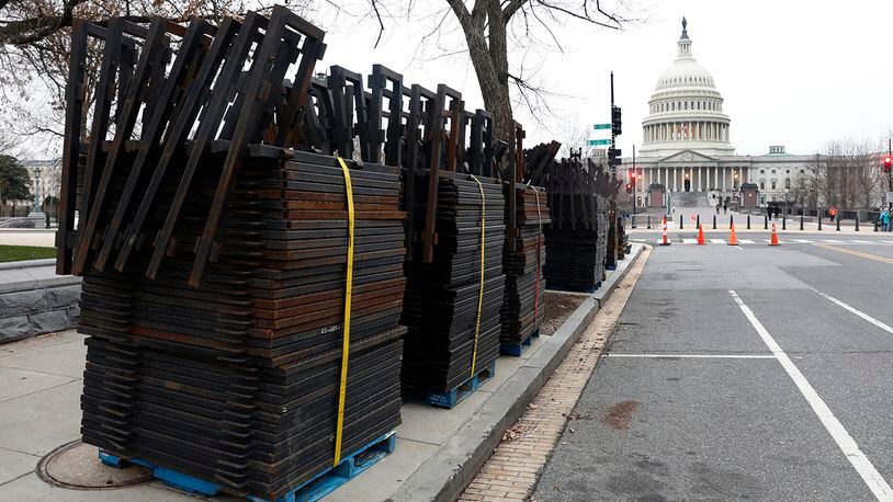 WASHINGTON, DC - JANUARY 16: Stacks of security fencing are seen near the US Capitol in preparation for the upcoming inauguration of President-elect Donald Trump January 16, 2017 in Washington, DC. Authorities expect tens of thousands of supporters and protesters to descend on Washington for Friday's Inauguration ceremony. (Photo by Aaron P. Bernstein/Getty Images)