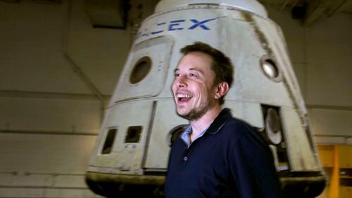 Elon Musk with the SpaceX Dragon capsule in April 2012. (Brian van der Brug/Los Angeles Times/TNS)