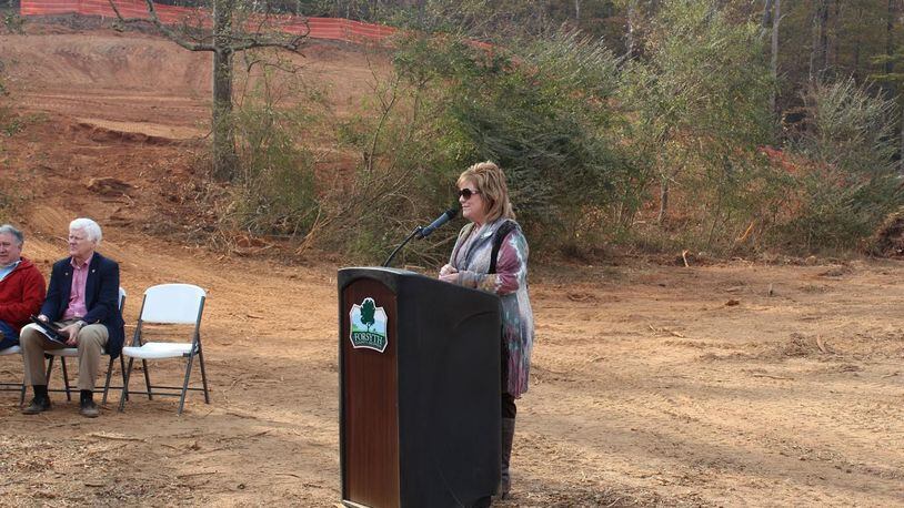 Forsyth County District 4 commissioner Cindy Jones Mills, seen speaking here at a park dedication, is the subject of an ethics complaint to be heard next month.