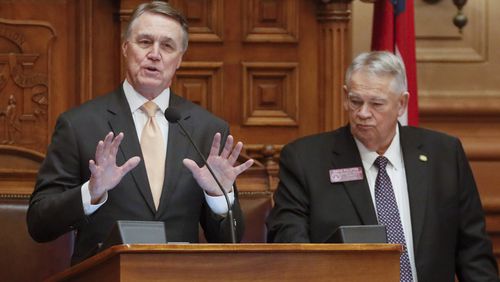 March 2, 2020 - Atlanta - Georgia Senator David Perdue, standing with House Speaker David Ralston, addresses the house after qualifying for a second term as the general assembly continued for the 22nd legislative day.  Bob Andres / robert.andres@ajc.com