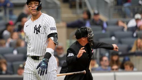 Homeplate umpire Ryan Blakney, right, ejects New York Yankees' Aaron Judge, left, from the game in the seventh inning of a baseball game against the Detroit Tigers, Saturday, May 4, 2024, in New York. (AP Photo/Mary Altaffer)