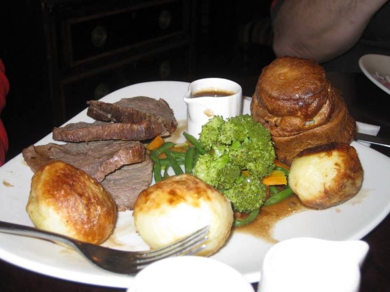 A traditional meal of roast beef and Yorkshire pudding is served at the Sherlock Holmes Pub and Restaurant in London. (Courtesy of Olivia King)