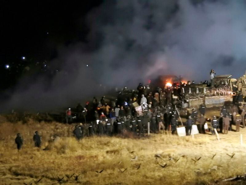 Law enforcement and protesters clash near the site of the Dakota Access pipeline in 2016. 
