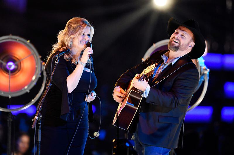 Trisha Yearwood and Garth Brooks perform onstage during MusiCares Person of the Year honoring Dolly Parton at Los Angeles Convention Center on February 8, 2019 in Los Angeles, California.