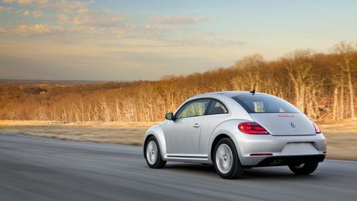 The 2014 Volkswagen Beetle TDI shown here is among the models covered by landmark settlements reached between state and federal regulators and Volkswagen. (Volkswagen/MCT)