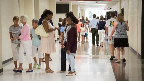 Parents and students fill the halls during an open house of the newly completed first phase of construction of Walton High School in Marietta, GA Sunday, July 30, 2017. All of the construction is scheduled to be completed mid-2019. STEVE SCHAEFER / SPECIAL TO THE AJC