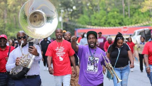 The J.K. Smith Sr. Foundation band led the march from the Golden Glide skating rink to the intersection of Wesley Chapel Road and Snapfinger Road on Thursday.