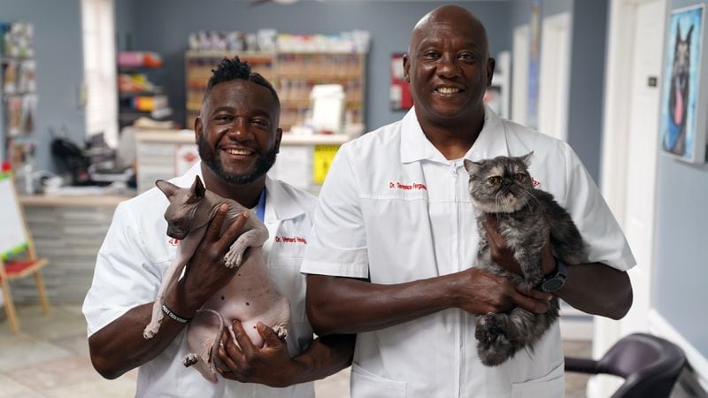 Dr. Vernard Hodges and Dr. Terrence Ferguson of National Geographic's CRITTER FIXERS stand for a portrait at the Critter Fixer Veterinary Hospital in Bonaire, GA. (National Geographic)