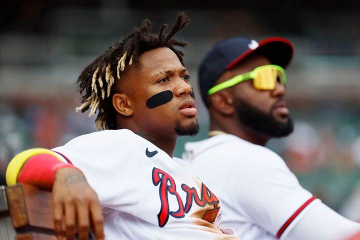 Braves right fielder Ronald Acuña Jr (left) and Marcell Ozone watched the Astros take the lead during the ninth inning at Truist Park on Sunday, April 23, 2023. The Braves lost 5-2.
Miguel Martinez / miguel.martinezjimenez@ajc.com 