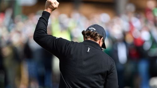 Phil Mickelson reacts to an eagle on the second green in the 81st Masters at the Augusta National Golf Club, Thursday April 6, 2017. BRANT SANDERLIN / SPECIAL