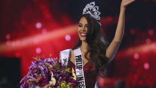 Catriona Gray of the Philippines waves to the audience after being crowned the new Miss Universe 2018 during the final round of the 67th Miss Universe competition in Bangkok, Thailand, Monday, Dec. 17, 2018.