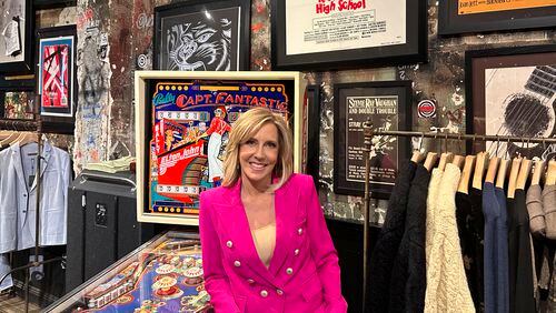CNN broadcast journalist Alisyn Camerota poses at the former CBGBs nightclub, now a high-end men's clothing outlet, on March 29, 2024 in New York, to promote her memoir "Combat Love: A Story of Leaving, Longing, and Searching for Home." (AP Photo/Dave Bauder)