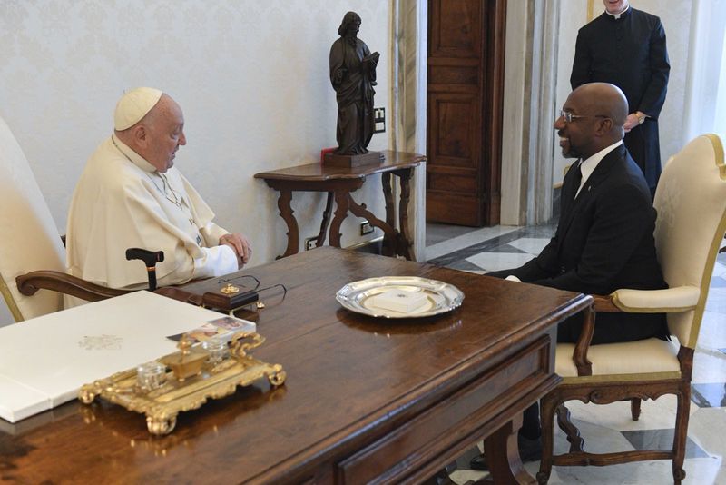 U.S. Sen. Raphael Warnock, an Atlanta Democrat, meets with Pope Francis at the Vatican on Saturday, April 20, 2024.