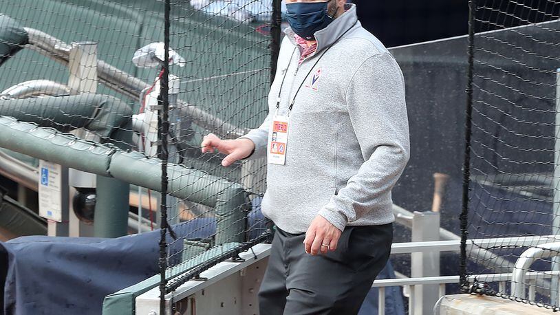 073020 Atlanta: Atlanta Braves general manager Alex Anthopoulos wears a mask as he enters the field at Truist Park before the team plays the Tampa Bay Rays in a MLB baseball game on Thursday, July 30, 2020 in Atlanta.    Curtis Compton ccompton@ajc.com