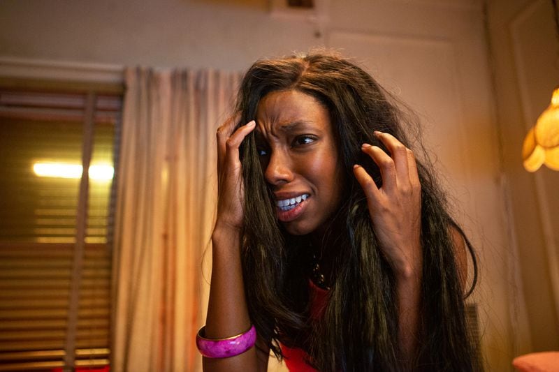 In this horror satire set in 1989, Bad Hair follows an ambitious young woman (Elle Lorraine) who gets a weave in order to succeed in the image-obsessed world of music television. However, her flourishing career comes at a great cost when she realizes that her new hair may have a mind of its own. -- Anna (Elle Lorraine), shown. (Photo by: Tobin Yellan/Hulu)
