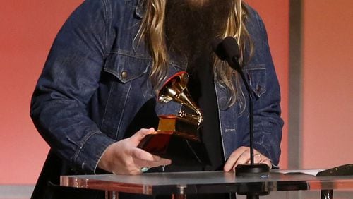 Chris Stapleton picks up his first-ever Grammy. Photo: AP.