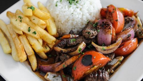 The Freakin Incan’s Lomo Saltado, stir-fried beef, served with white rice and fries. (Beckysteinphotography.com)