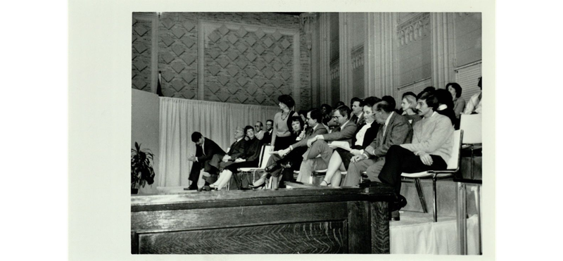 Atlanta Neighborhood Planning Units and City Council discusses the city's Comprehensive Development Plan on March 13, 1986. Council member Barbara Asher (standing) joined with Neighborhood Planning Unit chairmen in urging that changes to the Comprehensive Development Plan should occur only when public hearings are being held and not before.