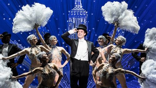 The Broadway in Atlanta national tour of “An American in Paris,” featuring Nick Spangler (center), continues through Aug. 20 at the Fox Theatre. CONTRIBUTED BY MATTHEW MURPHY